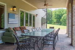 A covered patio offers a sheltered area for dining.