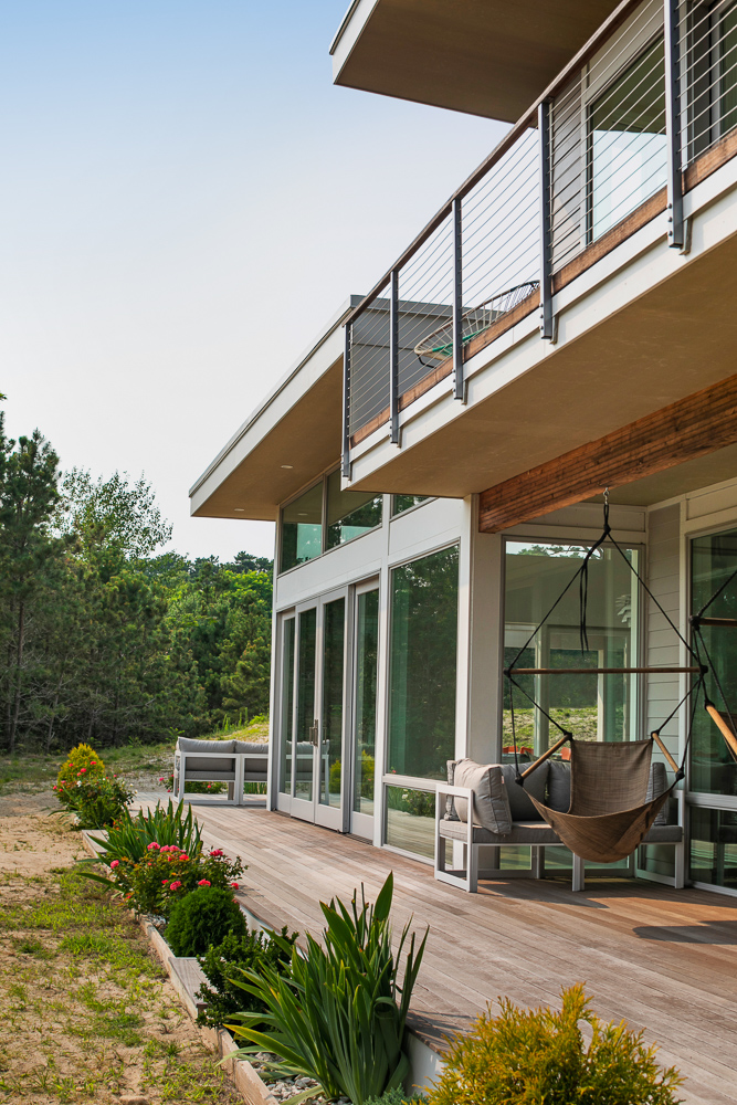 New construction on Cape Cod with double sliding door and outdoor entertaining space